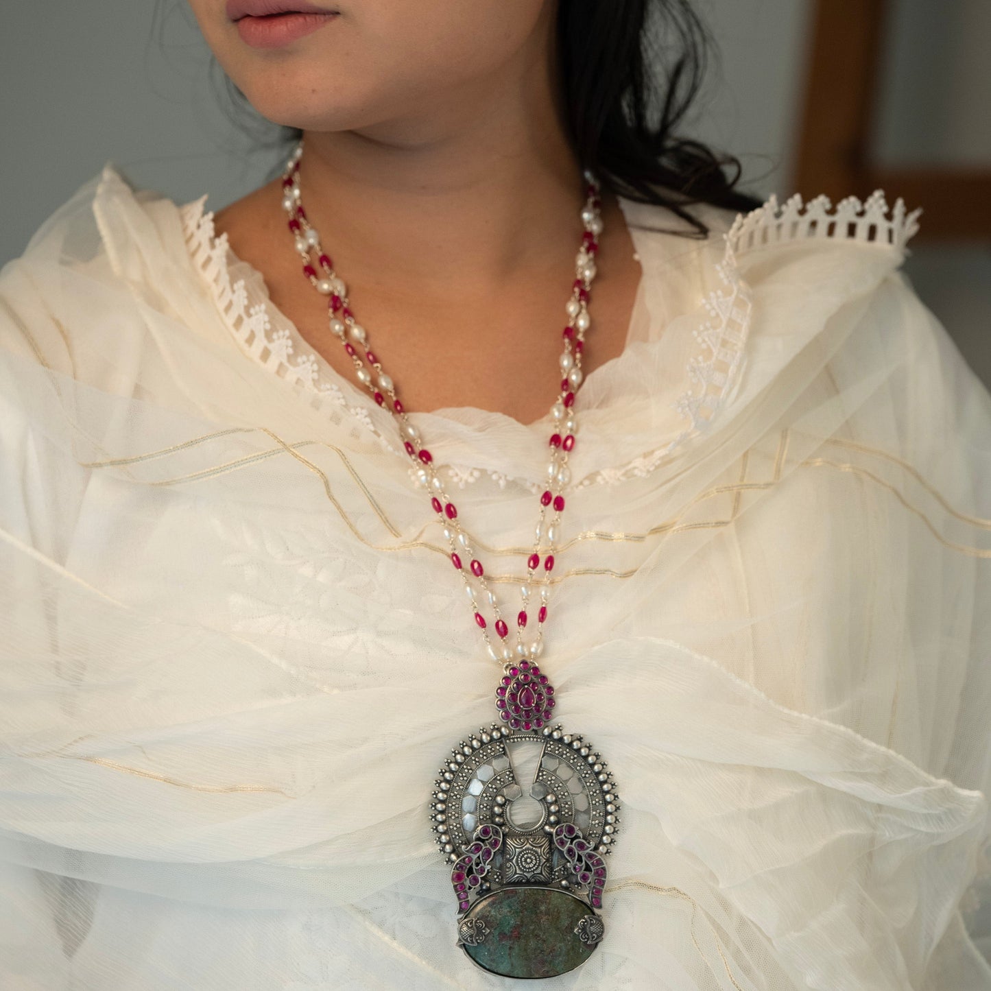 Oxidized sterling silver long necklace with a vintage-inspired charm and a timeless look.