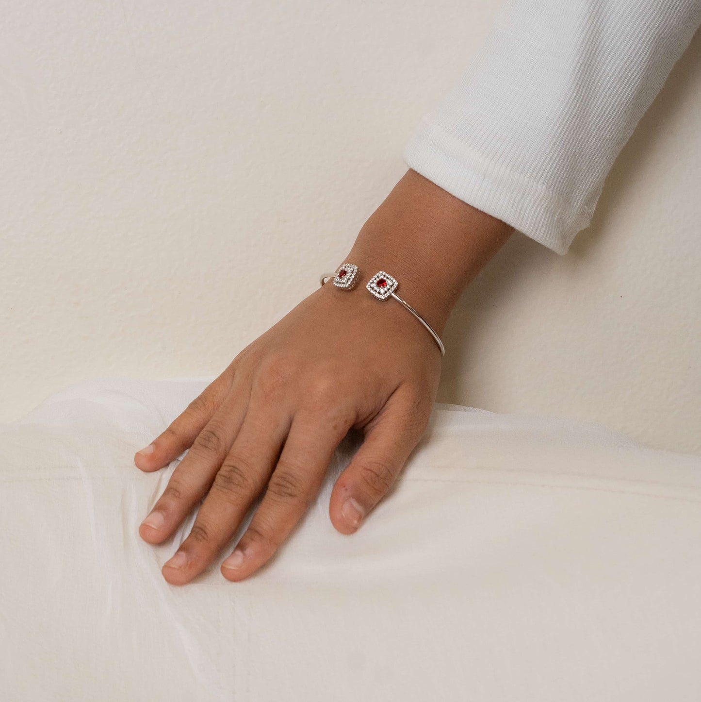 Elegant silver hand cuff or bracelet for women, featuring a sleek and sophisticated design, perfect for adding a touch of refinement to any outfit.