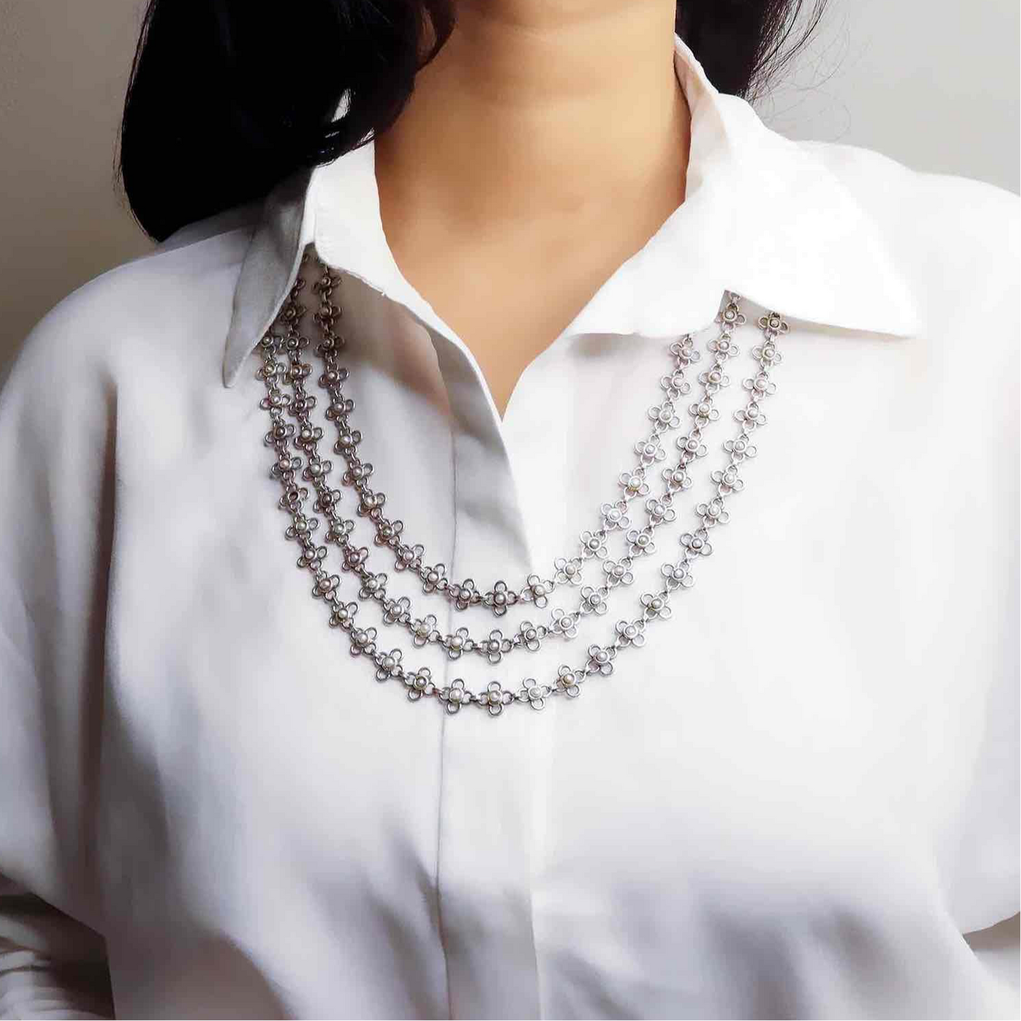 Striking oxidized silver necklace with detailed vintage-inspired patterns, offering a bold, unique look with a timeless, antique finish.