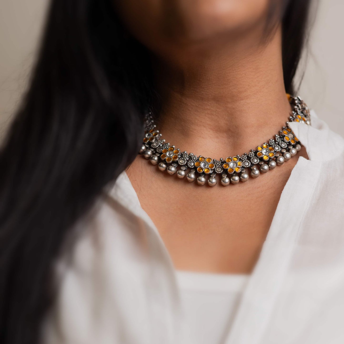 Striking oxidized silver necklace with detailed vintage-inspired patterns, offering a bold, unique look with a timeless, antique finish.