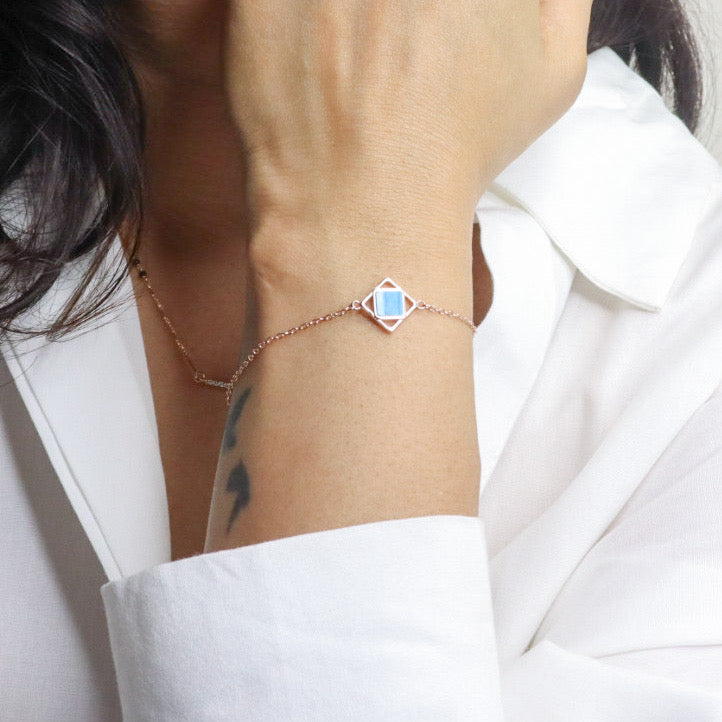 Elegant silver bracelet with a rose gold finish for women, featuring a sleek and sophisticated design, perfect for adding a touch of warmth and luxury to any outfit