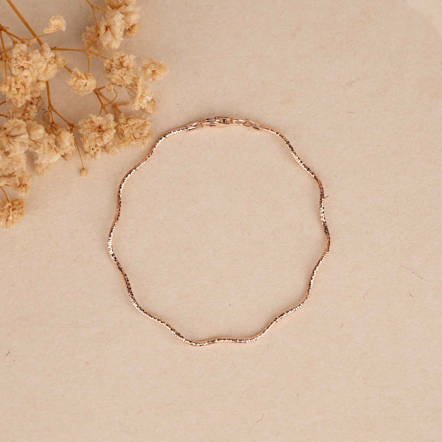 Sleek Wavy Rose Gold Bracelet