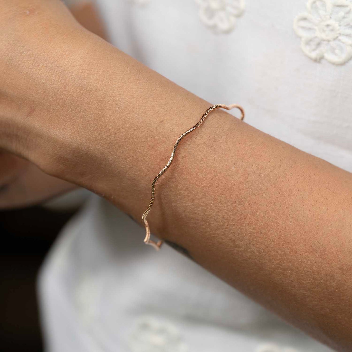 Sleek Wavy Rose Gold Bracelet
