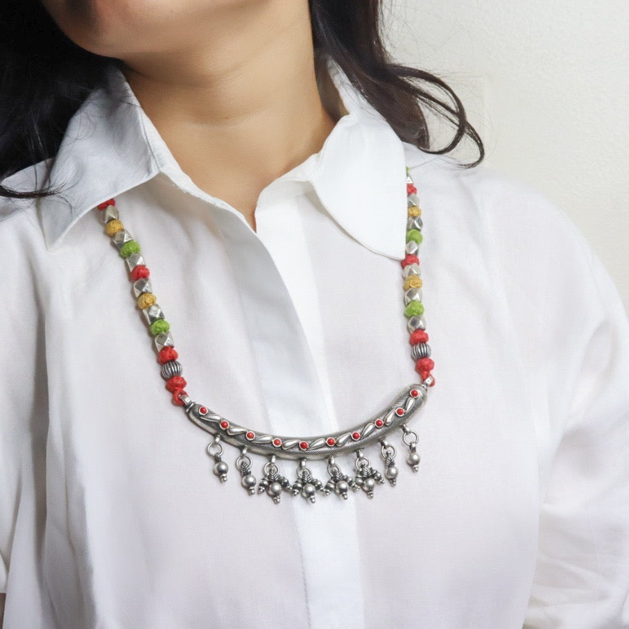 Striking oxidized silver necklace with detailed vintage-inspired patterns, offering a bold, unique look with a timeless, antique finish.