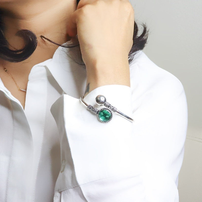 Elegant silver hand cuff or bracelet for women, featuring a sleek and sophisticated design, perfect for adding a touch of refinement to any outfit.