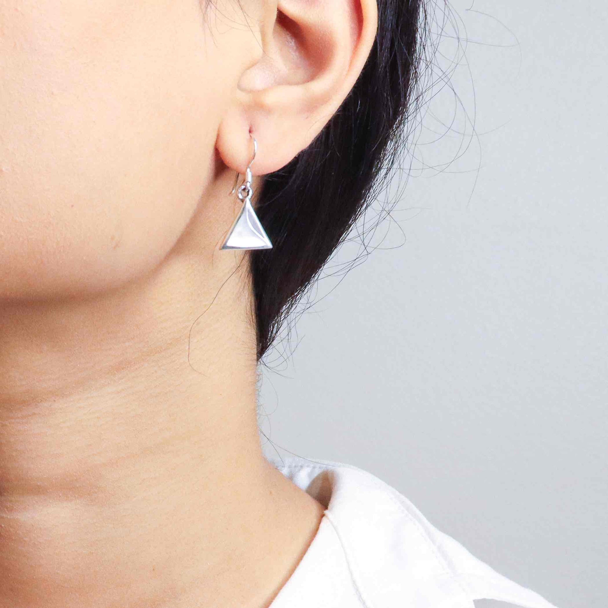 Stylish silver earrings featuring a sleek and modern design for everyday elegance