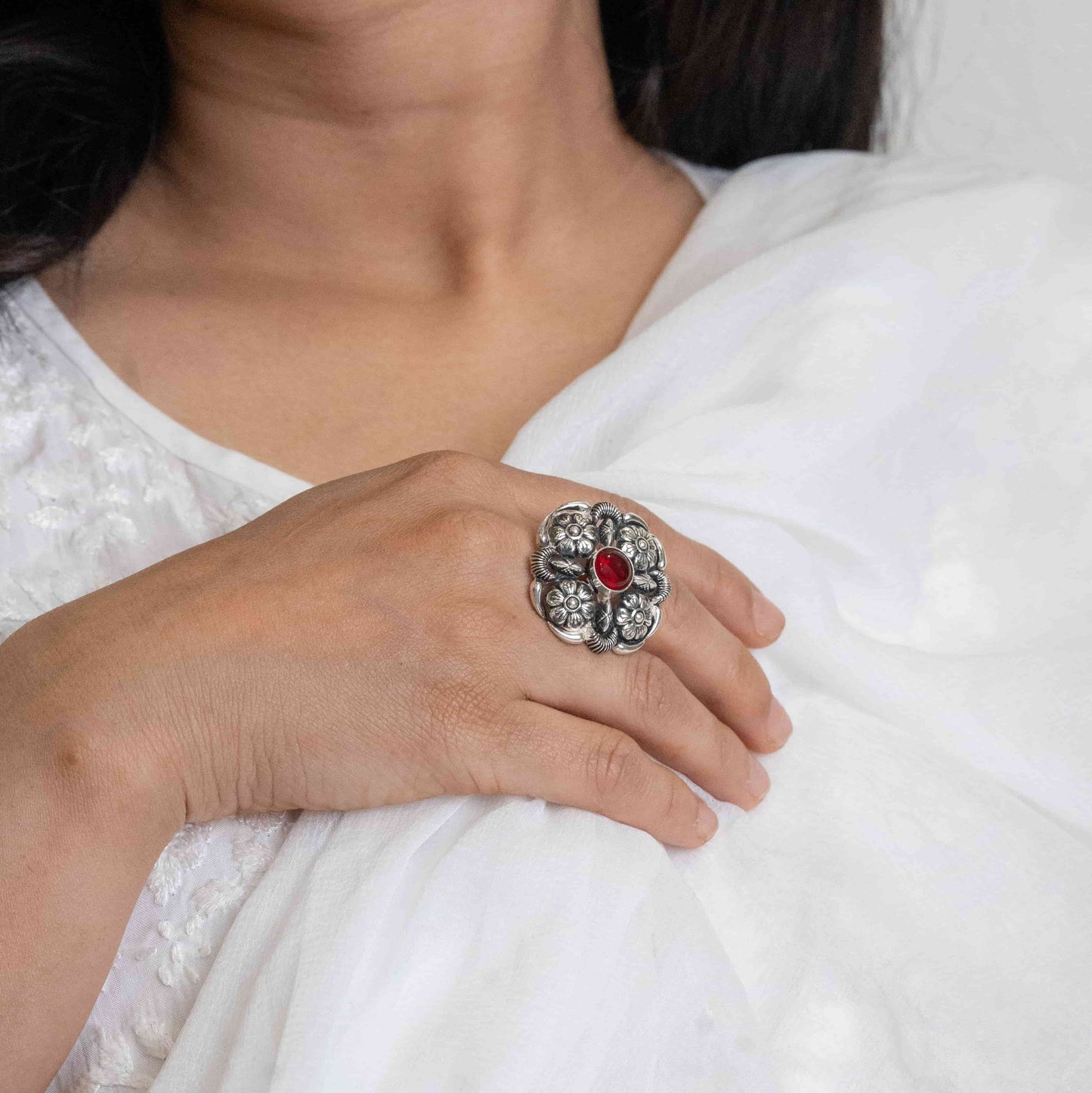 image of a silver ring with an oxidised finish