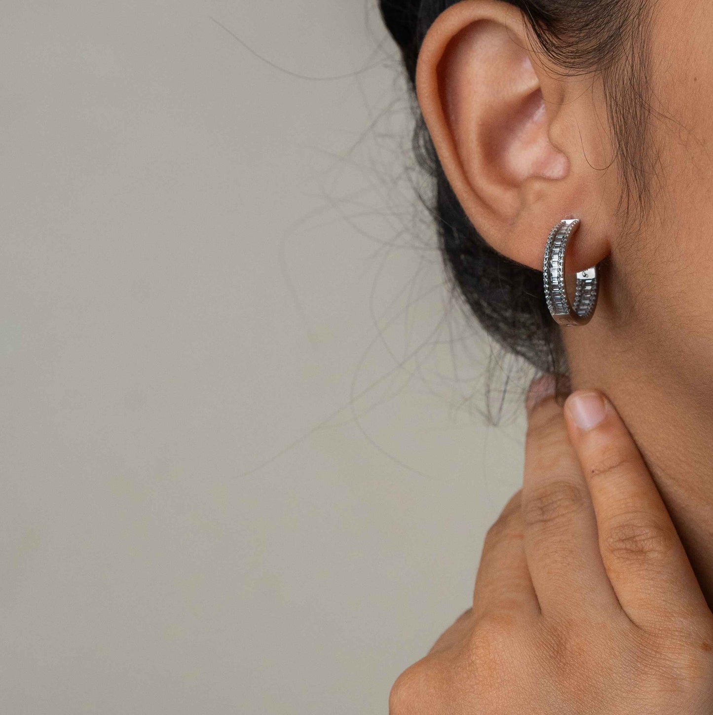 Stylish silver earrings featuring a sleek and modern design for everyday elegance