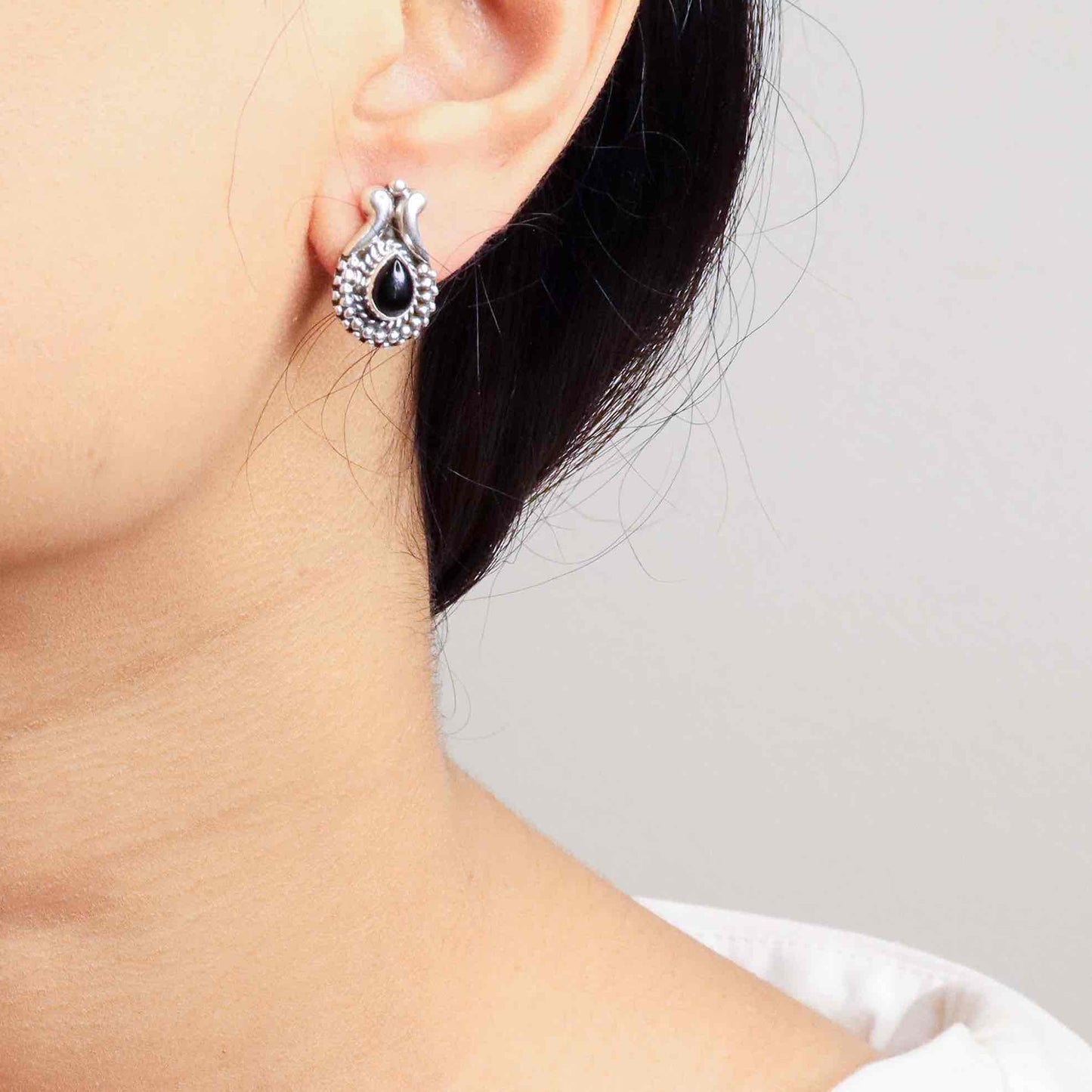 Timeless silver studs exuding simple elegance and subtle sophistication