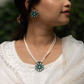 Elegant pearl necklace with matching sterling silver earrings, perfect gift for a wife.
