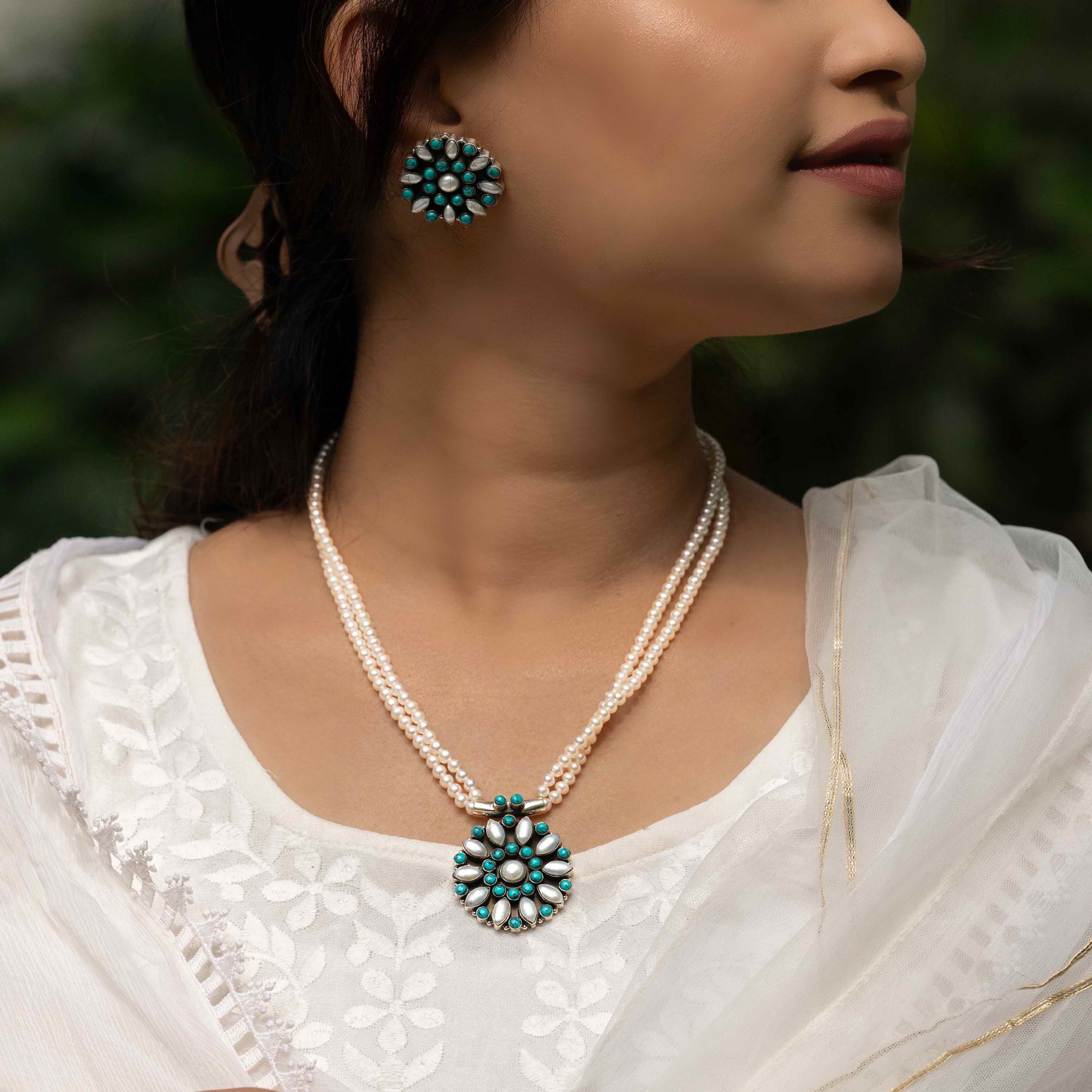 Elegant pearl necklace with matching sterling silver earrings, perfect gift for a wife.