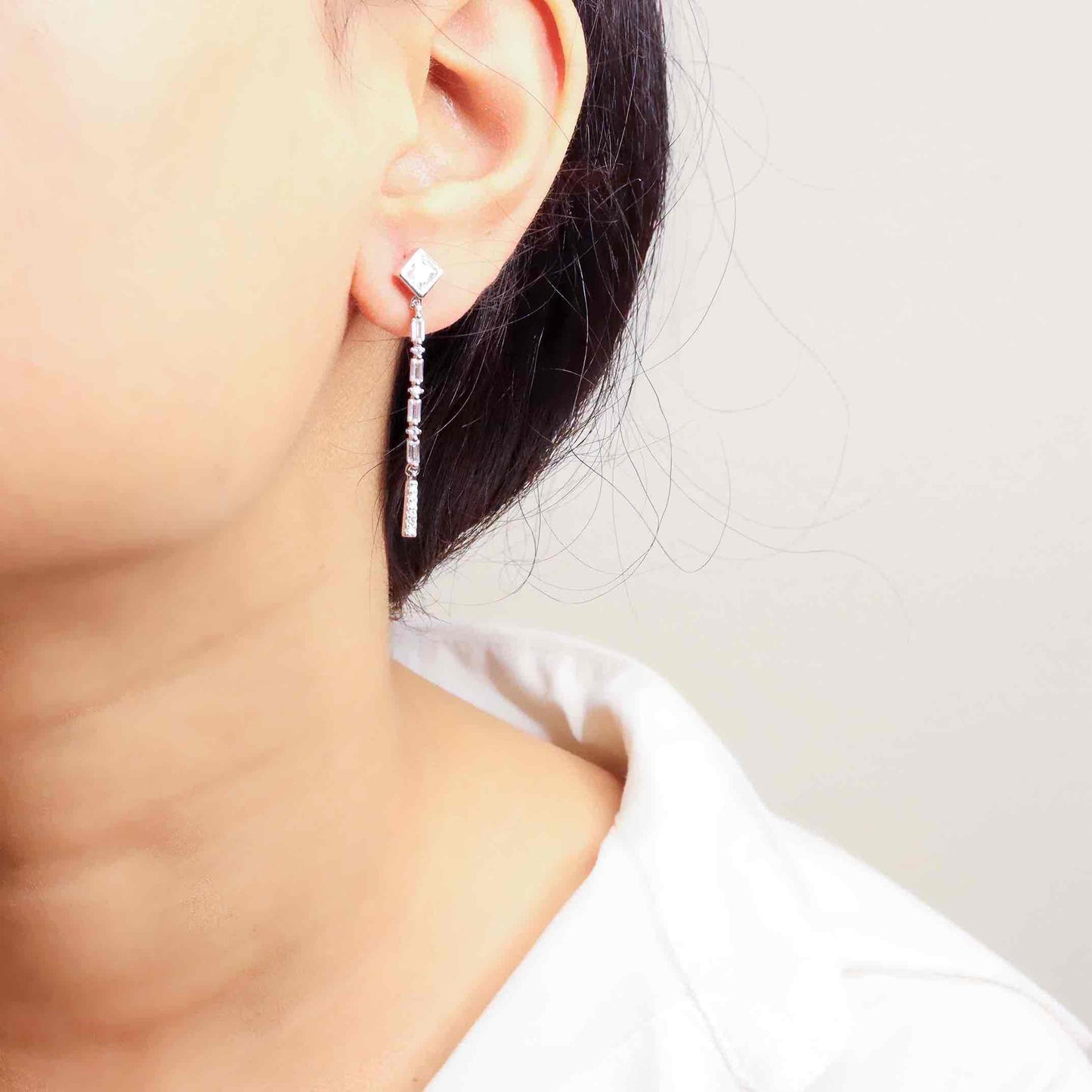 Stylish silver earrings featuring a sleek and modern design for elegant look