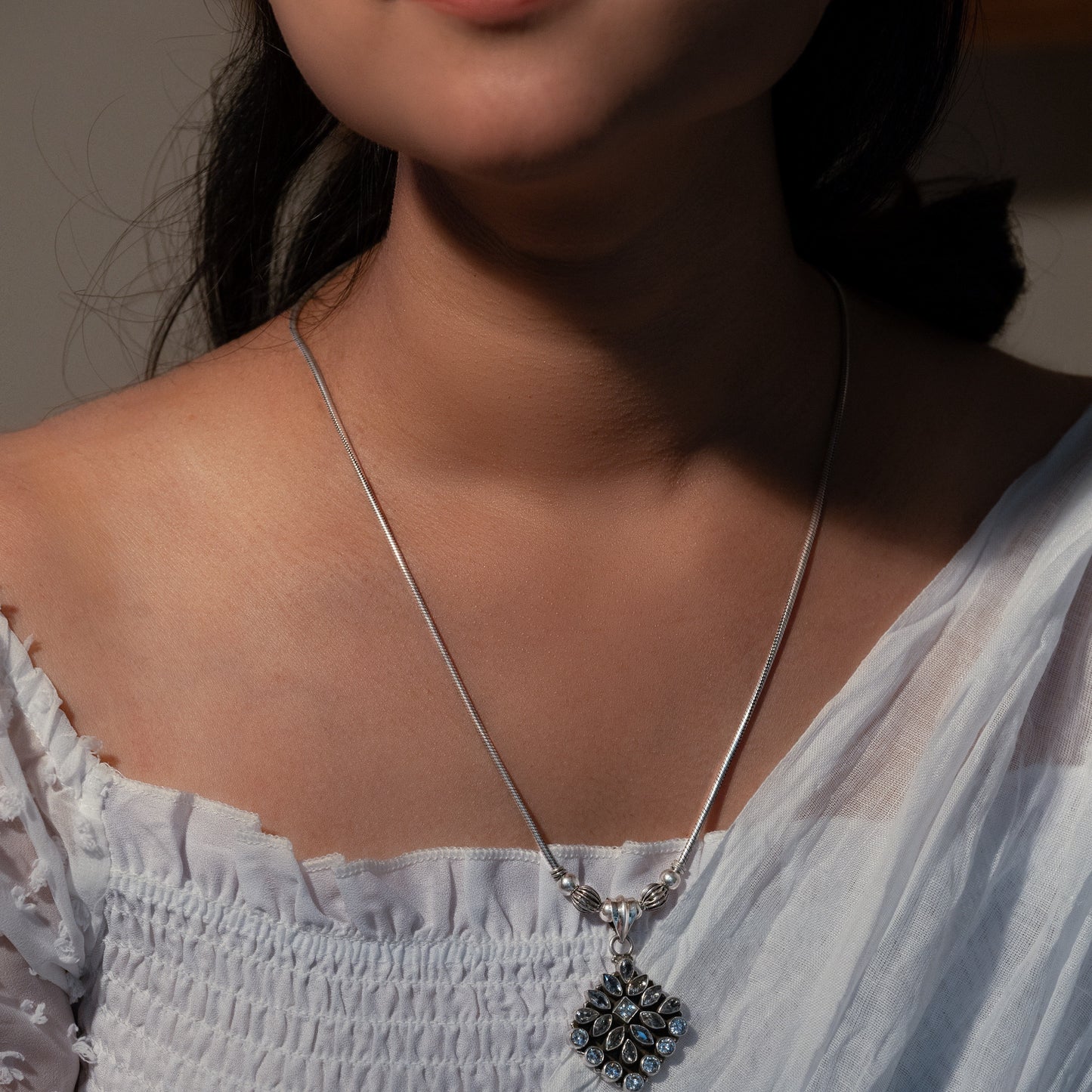 Oxidized silver pendant necklace with vintage charm, ideal for traditional and modern outfits