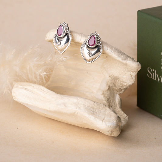 Timeless silver studs exuding simple elegance and subtle sophistication