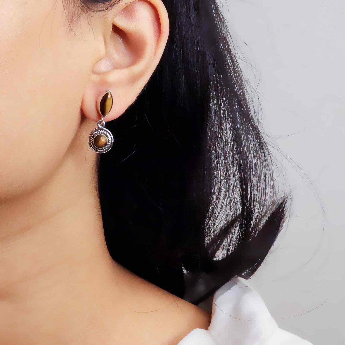 Stylish silver earrings featuring a sleek and modern design for everyday elegance