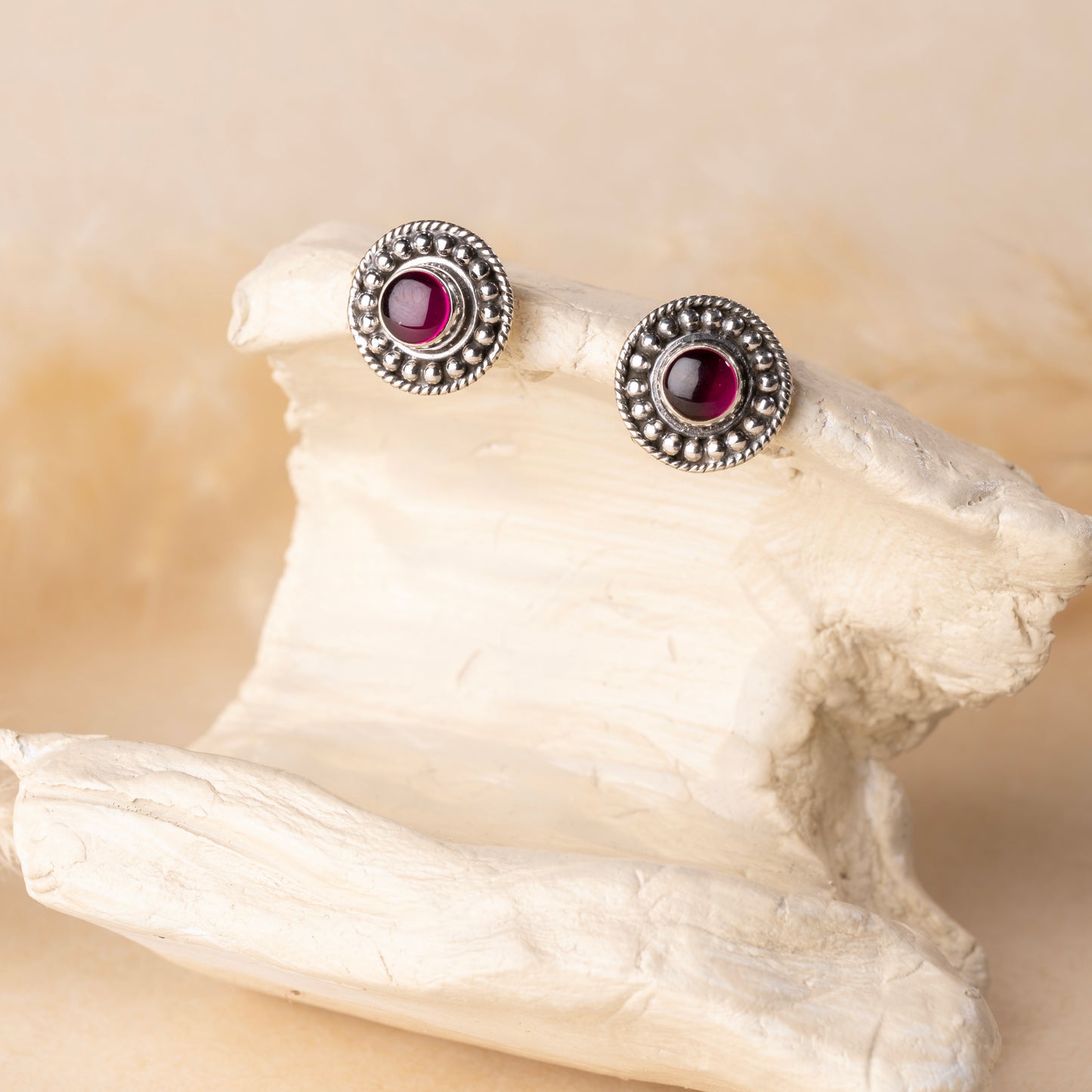 Timeless silver studs exuding simple elegance and subtle sophistication