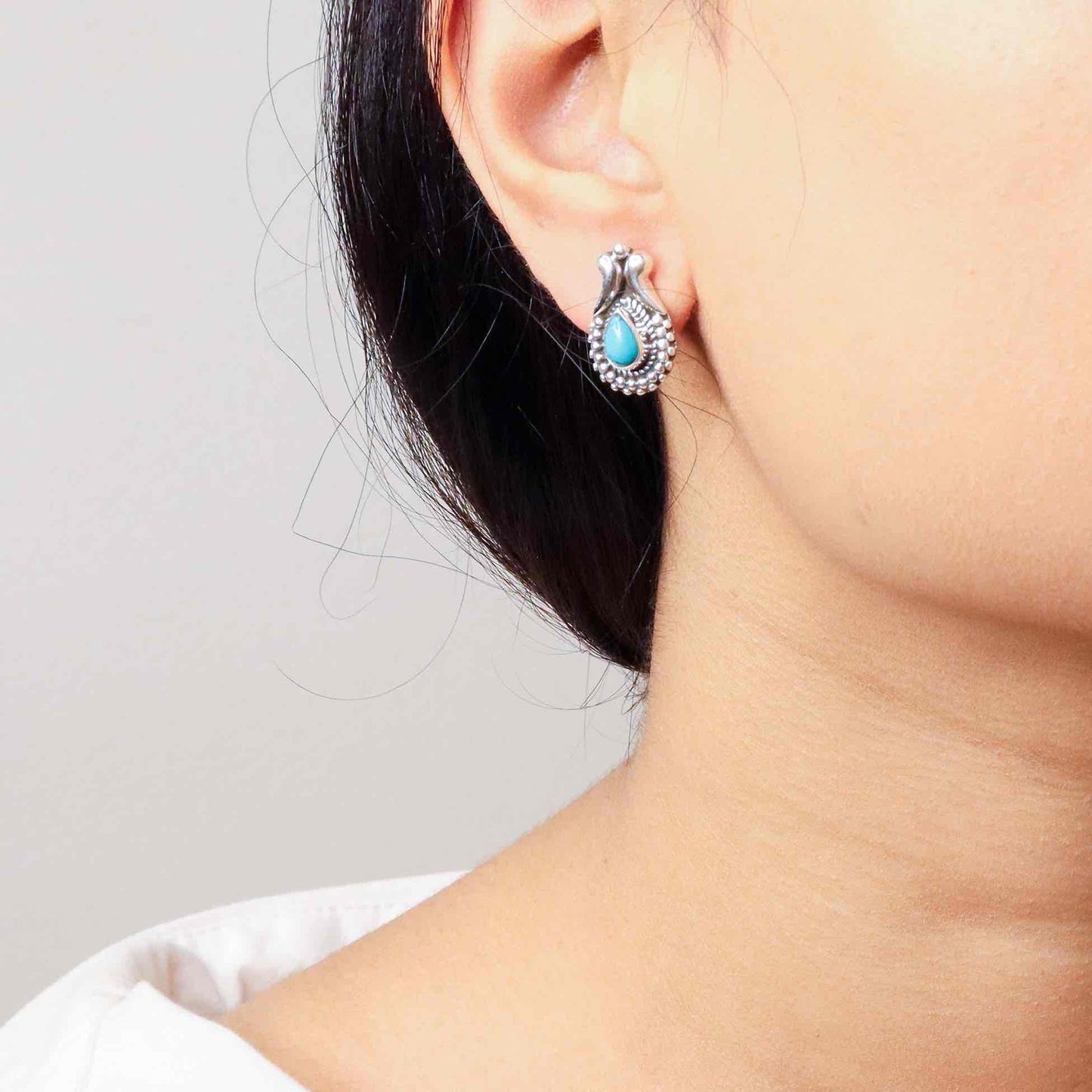 Timeless silver studs exuding simple elegance and subtle sophistication