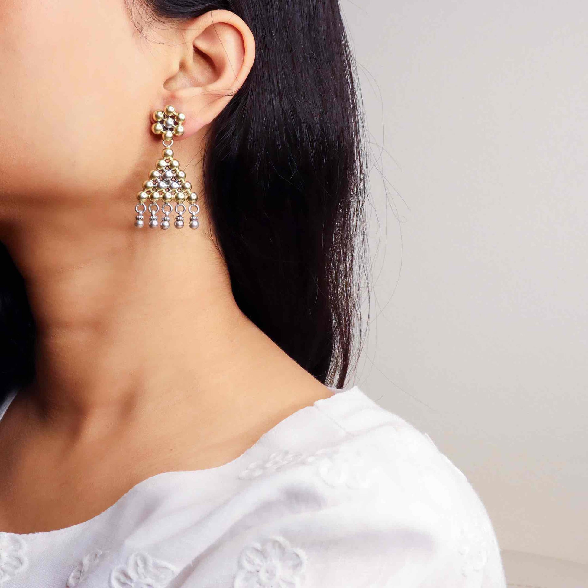 Elegant silver oxidized long earrings with intricate patterns and vintage-inspired charm