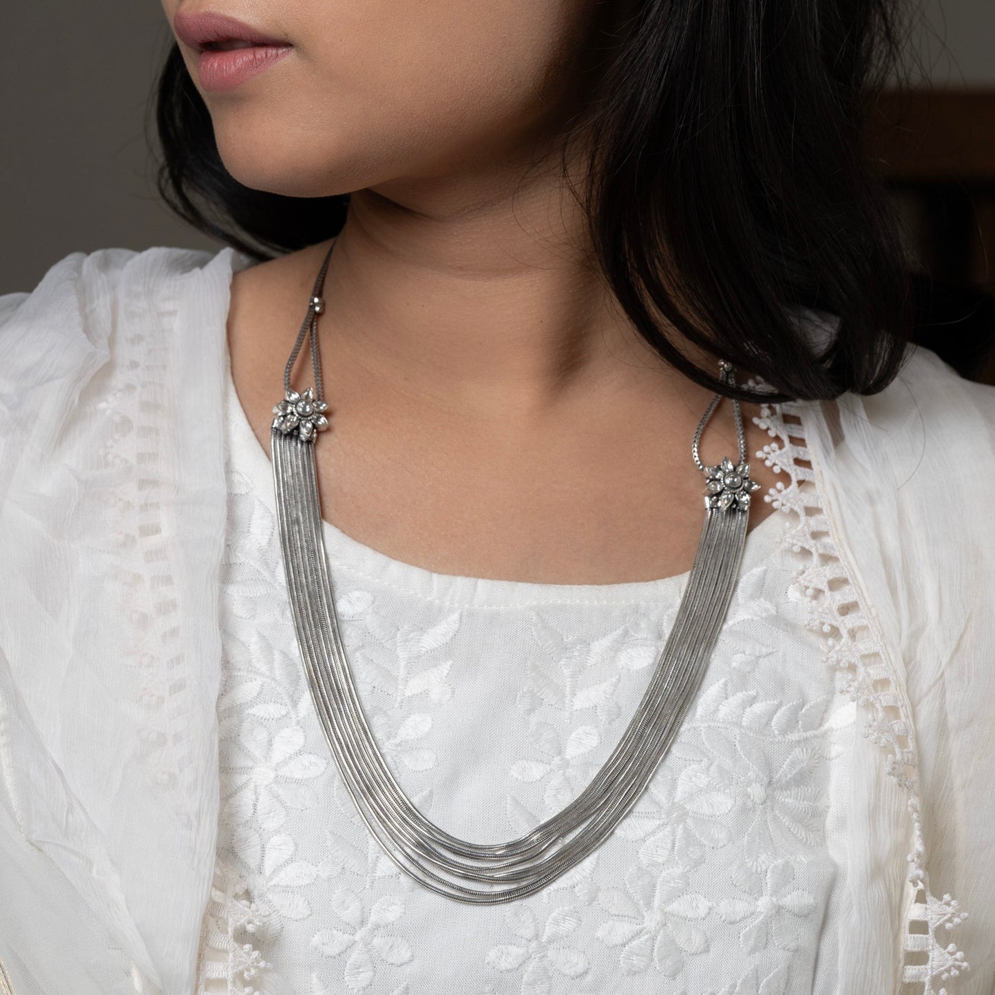 Elegant sterling silver long necklace with a sleek, minimalist design, perfect for layering.