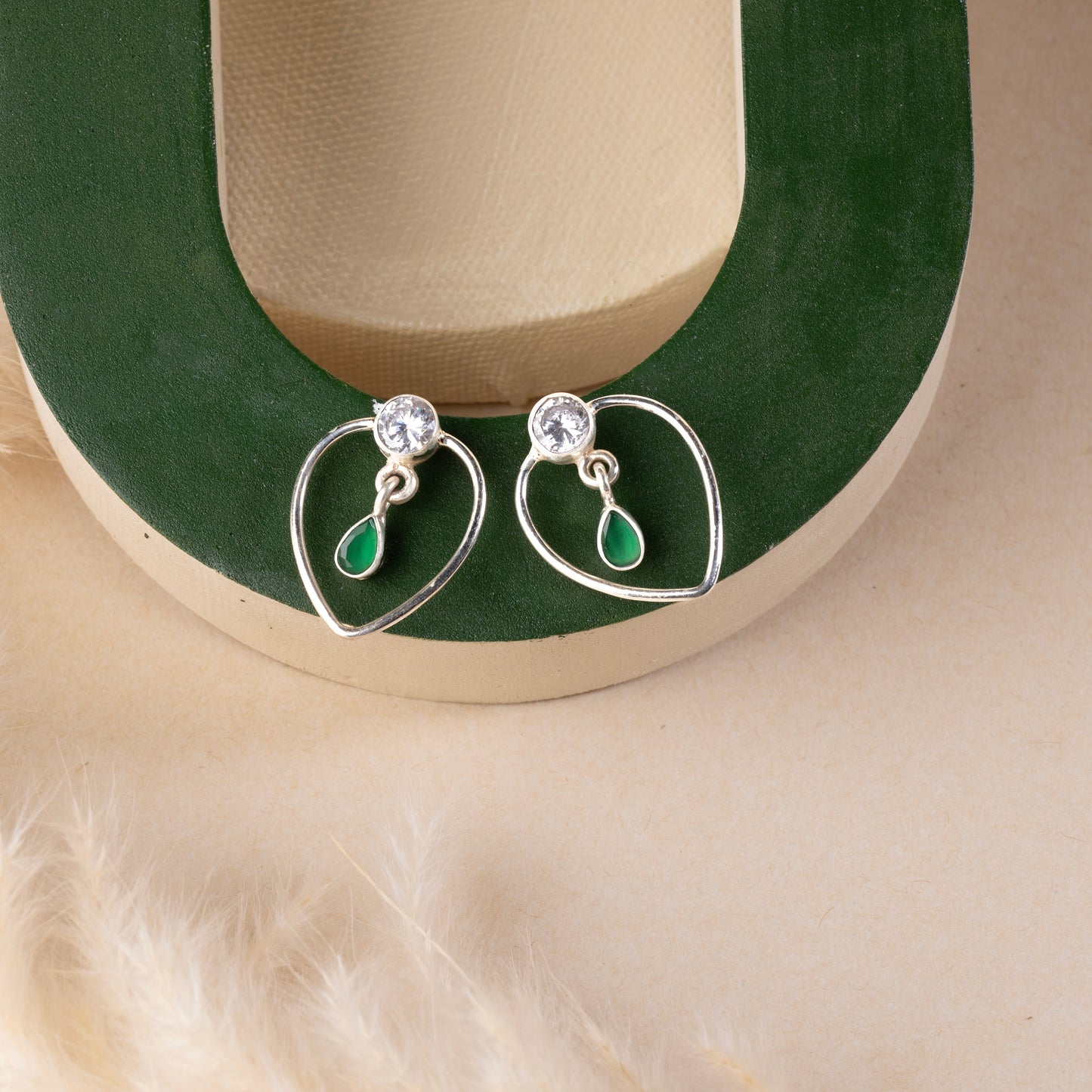 Lightweight silver earrings offering effortless elegance and comfort for daily wear.