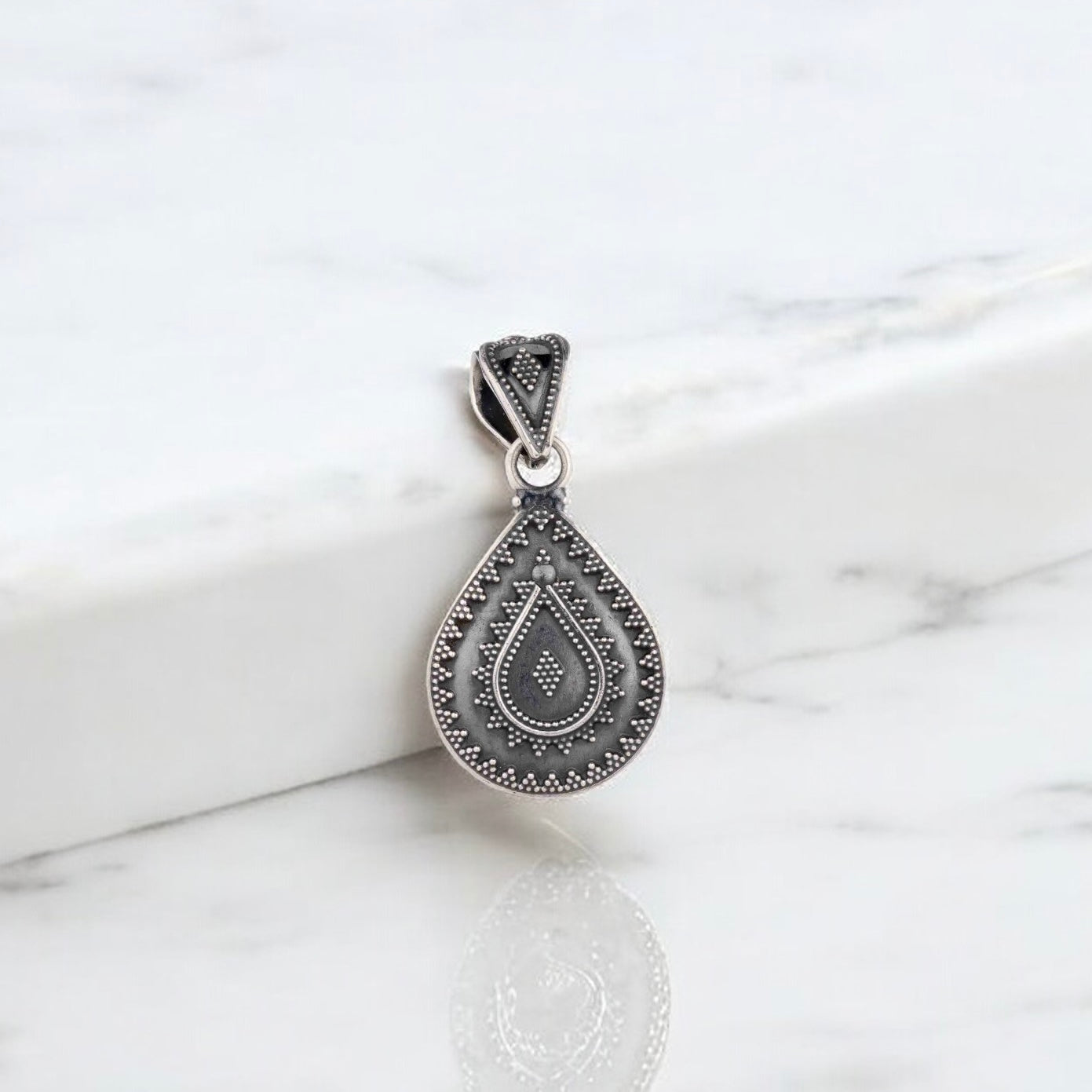 Simple sterling silver pendant with a oxidised finish perfect for everyday wear.