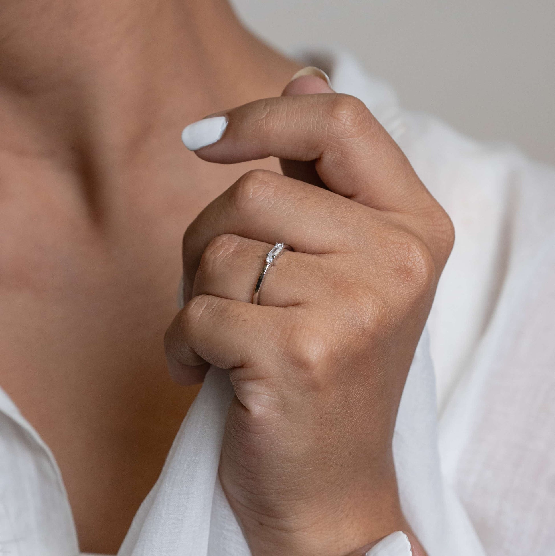 image of a silver ring, featuring a sparkling Cubic Zirconia gemstone