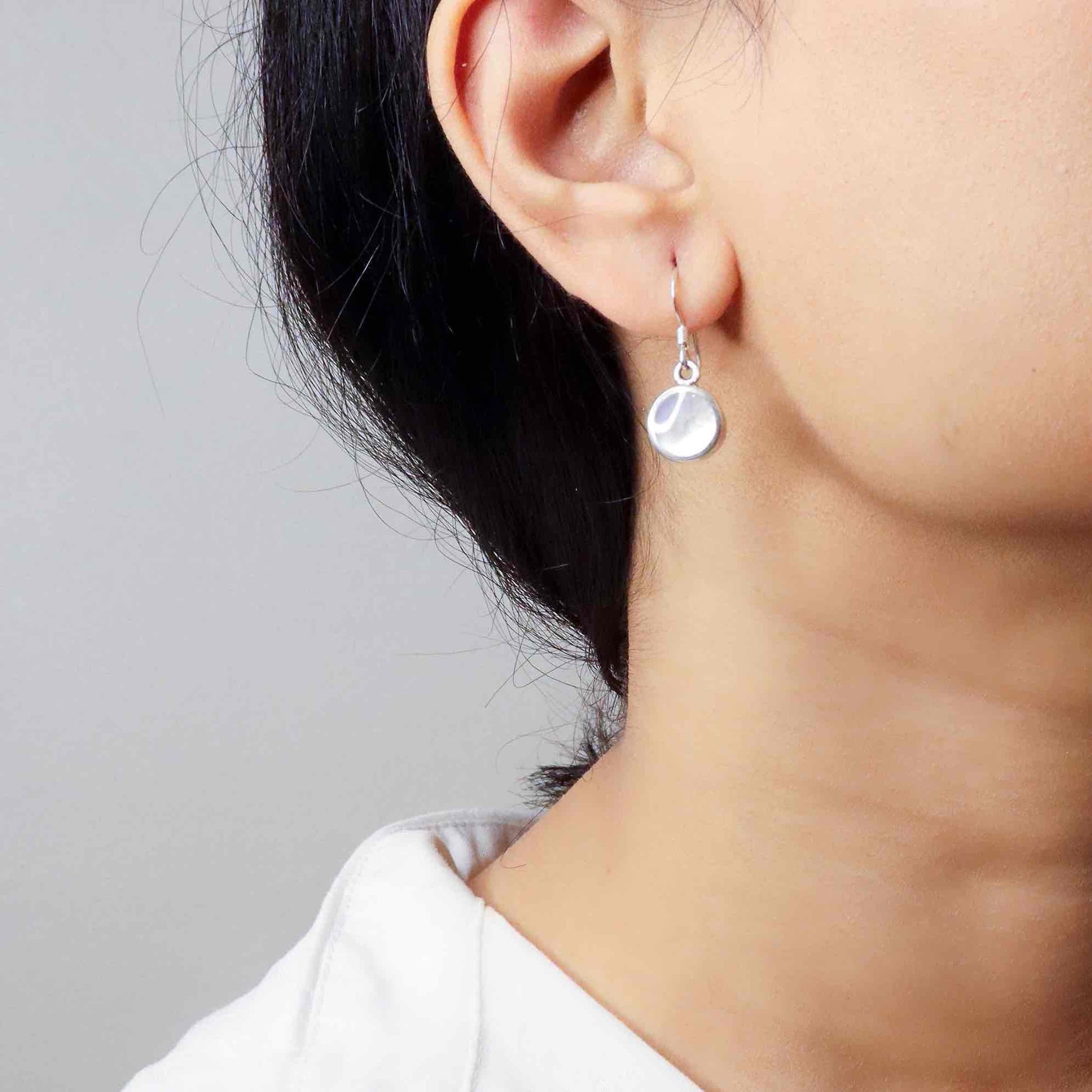 Stylish silver earrings featuring a sleek and modern design for everyday elegance