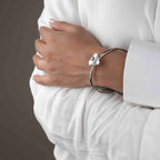 Stylish silver hand cuff or bracelet for women, designed with sleek elegance and modern flair