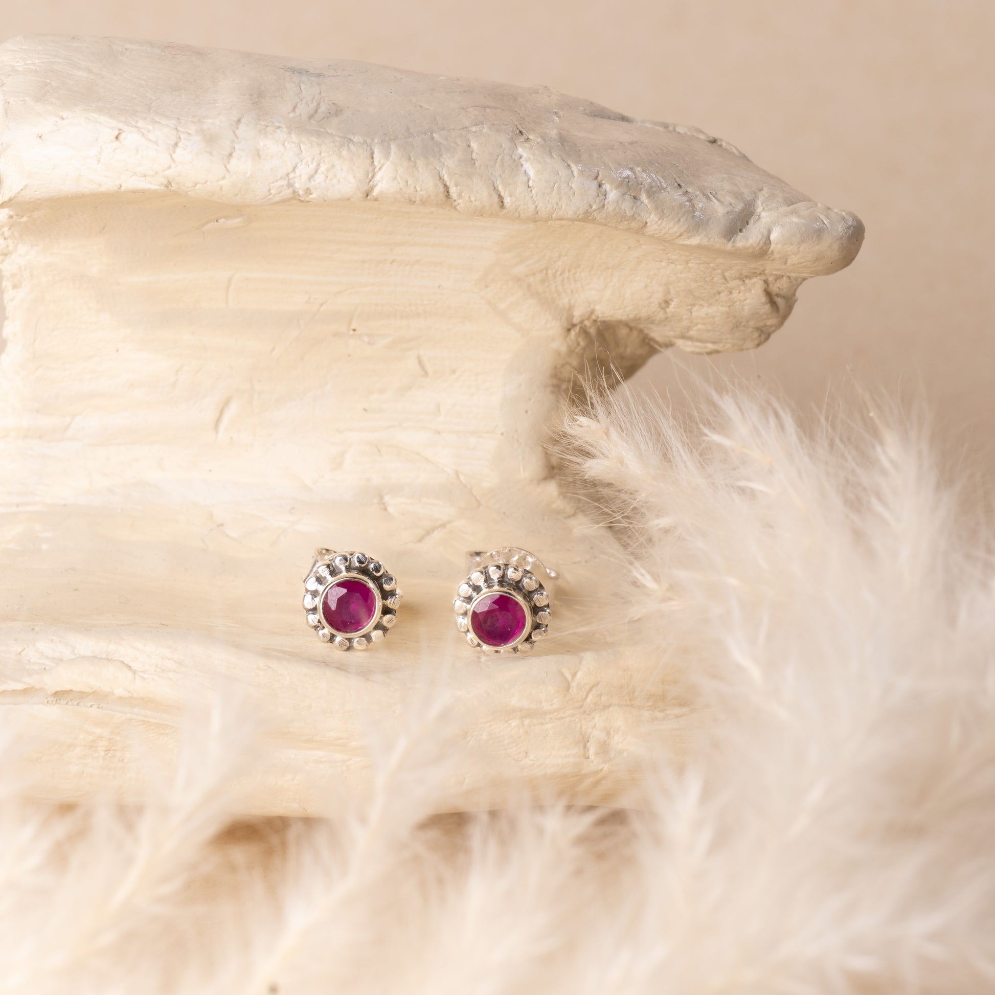 Timeless silver studs exuding simple elegance and subtle sophistication