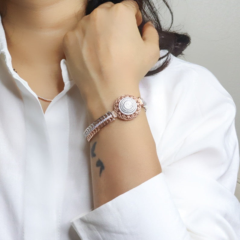 Stylish silver bracelet with a snake design, featuring a sleek and modern look perfect for women seeking a unique and elegant accessory
