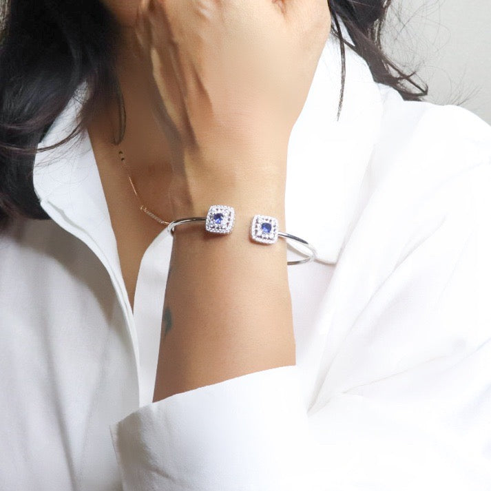 Elegant silver hand cuff or bracelet for women, featuring a sleek and sophisticated design, perfect for adding a touch of refinement to any outfit.
