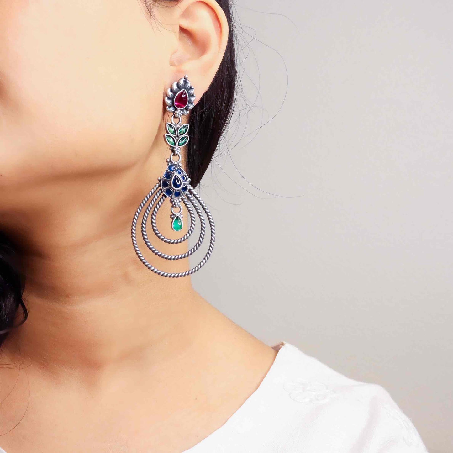 Elegant silver oxidized long earrings with intricate patterns and vintage-inspired charm