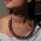 Handcrafted sterling silver long necklace featuring intricate detailing and a polished finish."