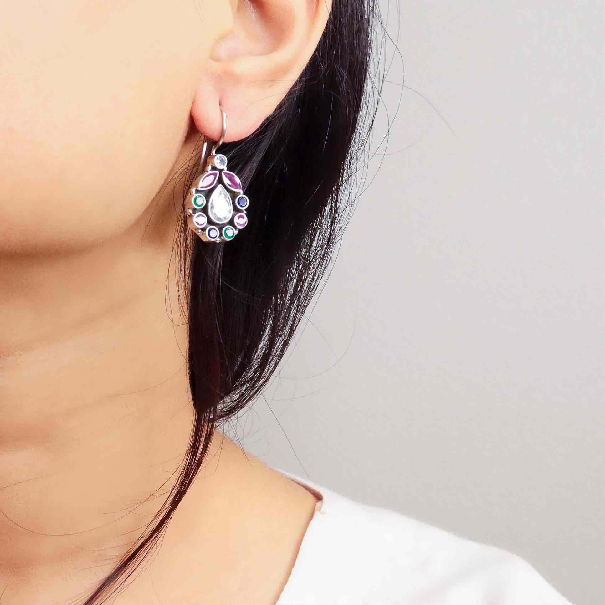 Stylish silver earrings featuring a sleek and modern design for everyday elegance