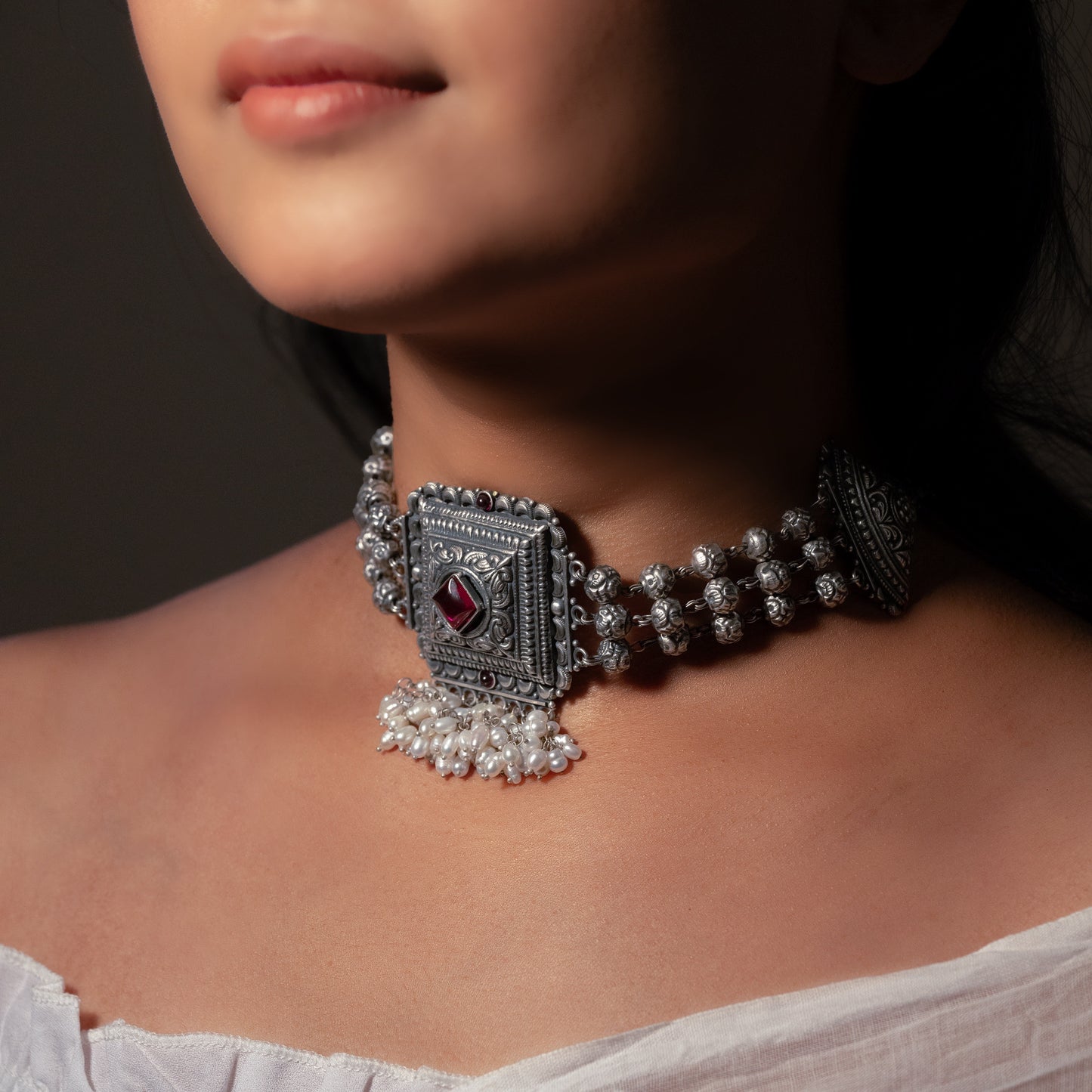 Beautiful oxidized silver choker with intricate patterns and a vintage finish, offering a bold, antique look for statement styling.