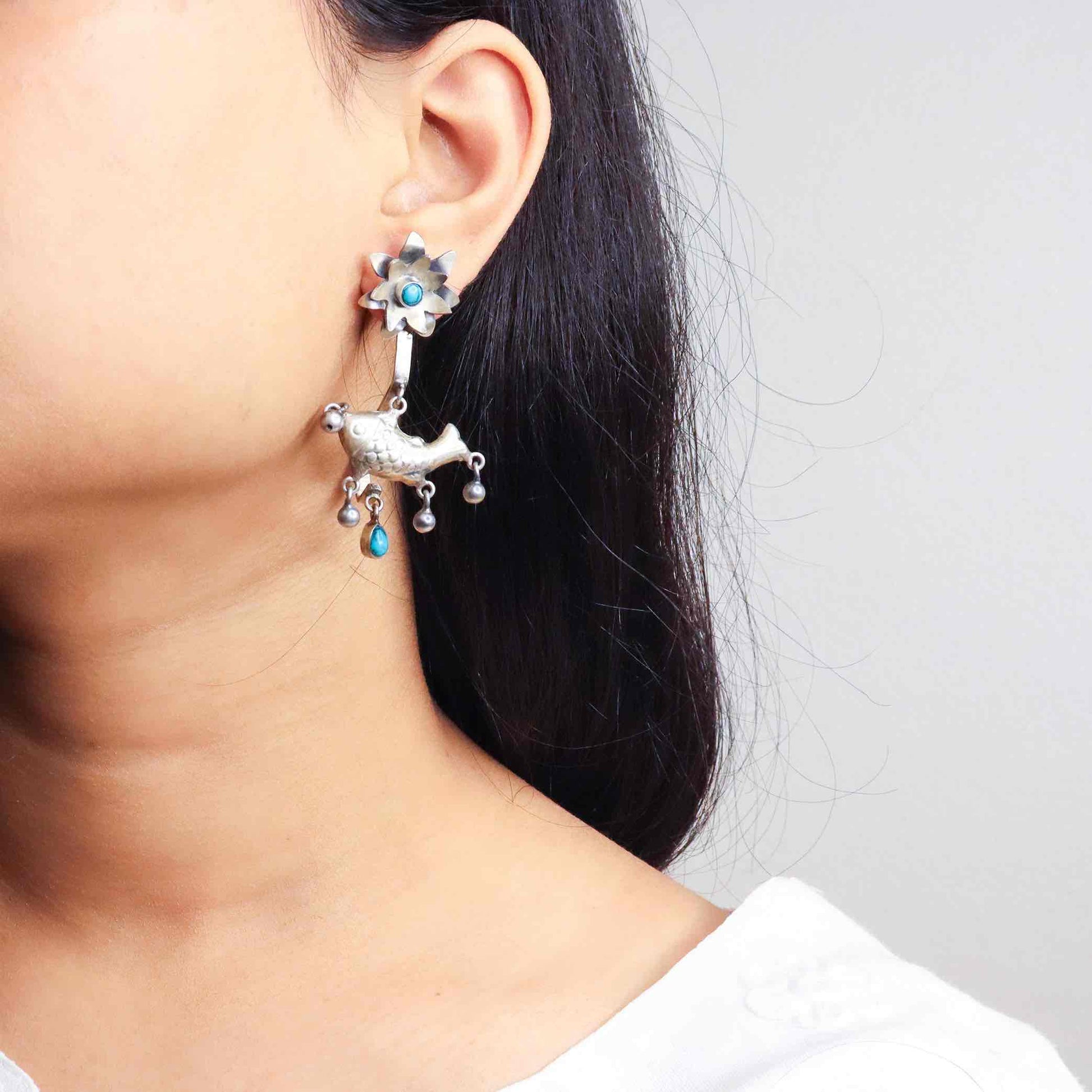 Elegant silver oxidized long earrings with intricate patterns and vintage-inspired charm