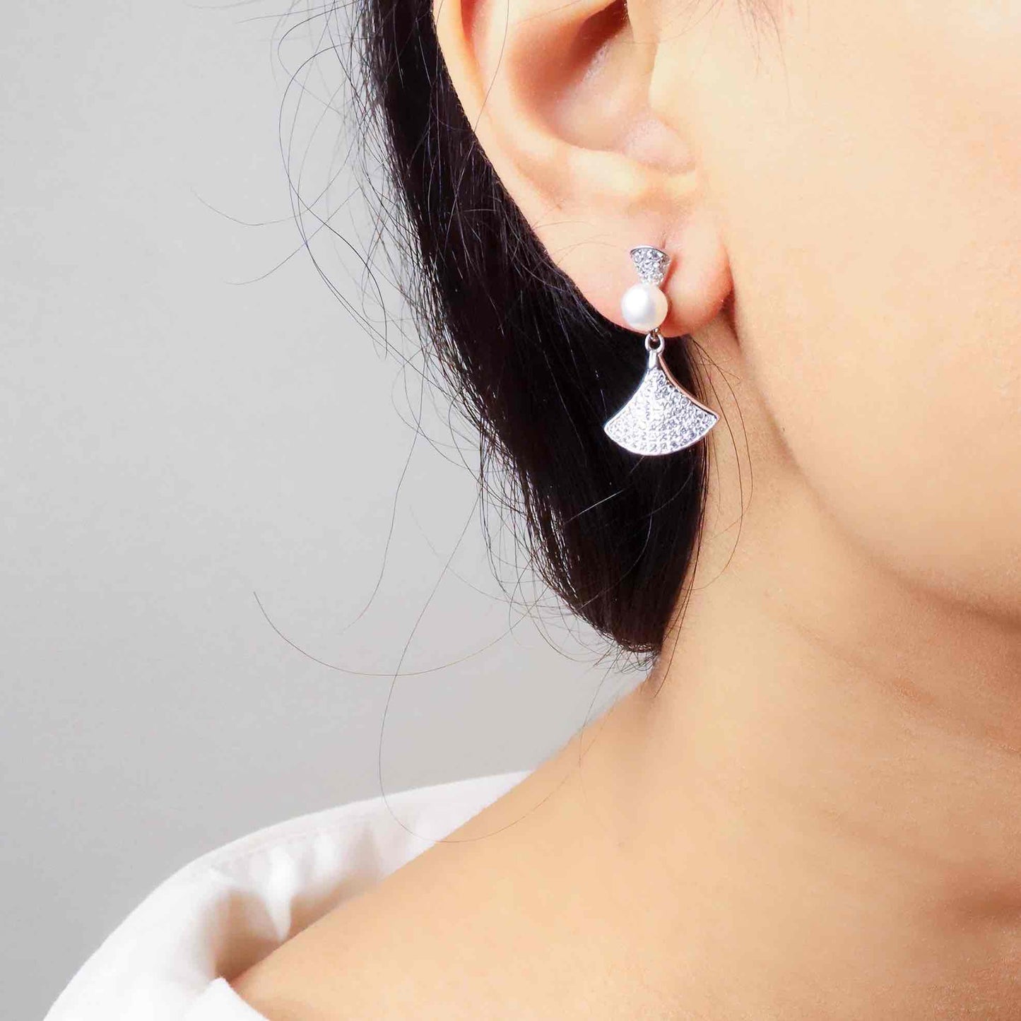 Stylish silver earrings featuring a sleek and modern design for everyday elegance