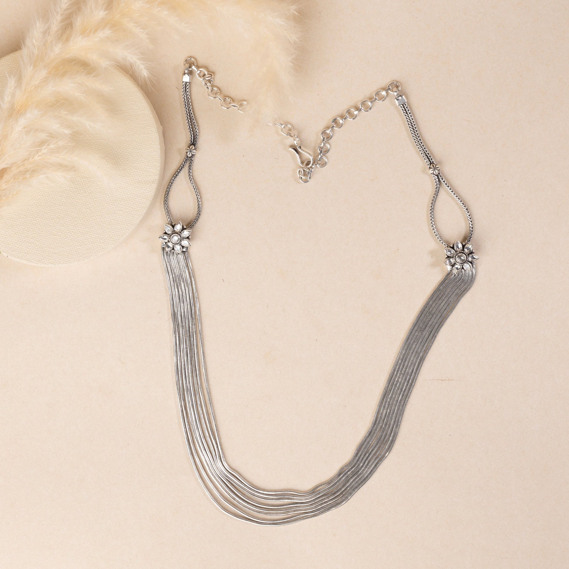 Elegant sterling silver long necklace with a sleek, minimalist design, perfect for layering.