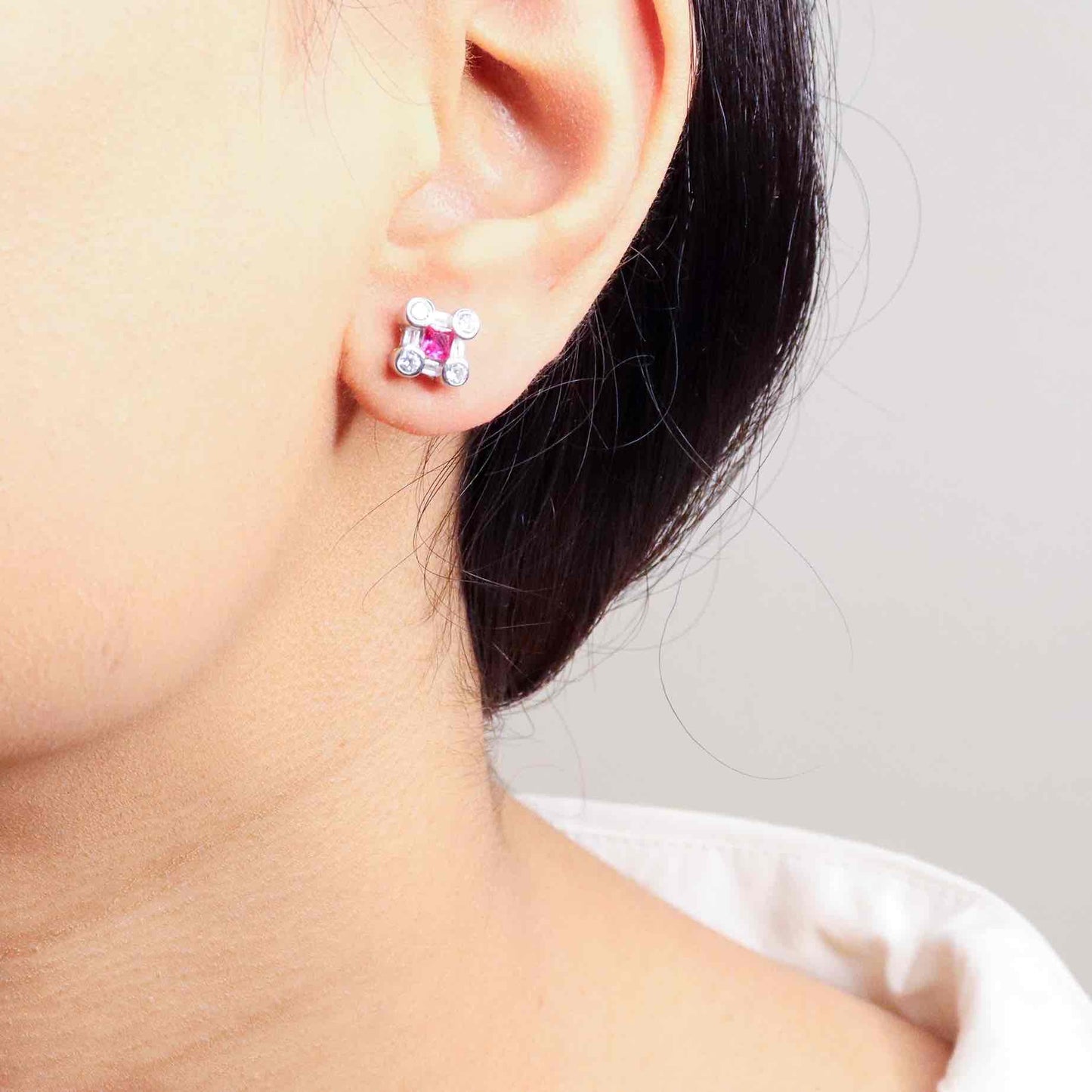 Brilliant cubic zirconia silver studs radiating with classic elegance