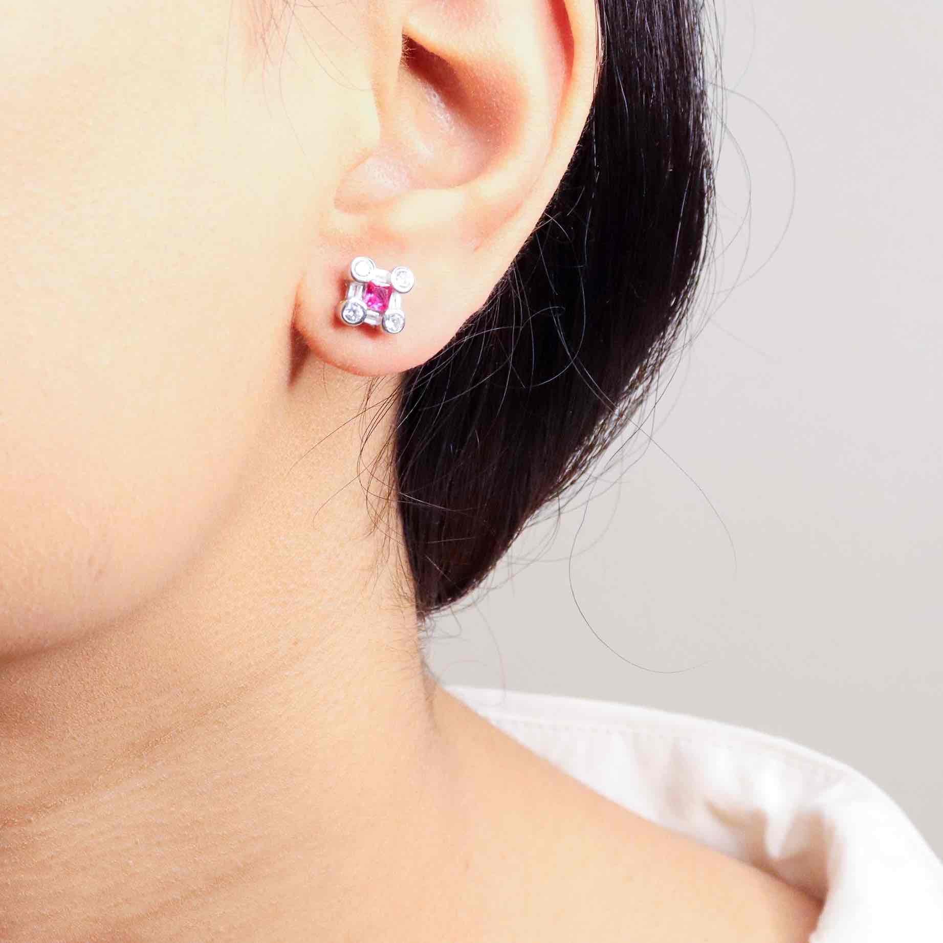 Brilliant cubic zirconia silver studs radiating with classic elegance