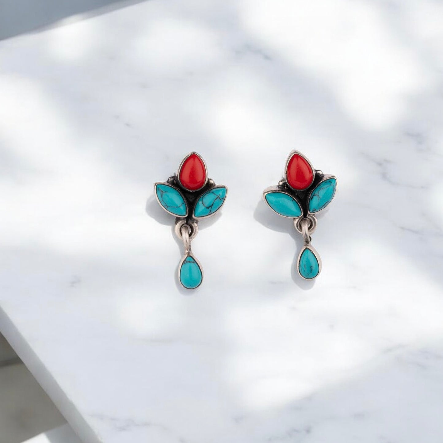 Lightweight silver earrings offering effortless elegance and comfort for daily wear.