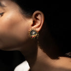 Stunning silver ethnic earrings with intricate detailing, embodying traditional elegance and grace. 