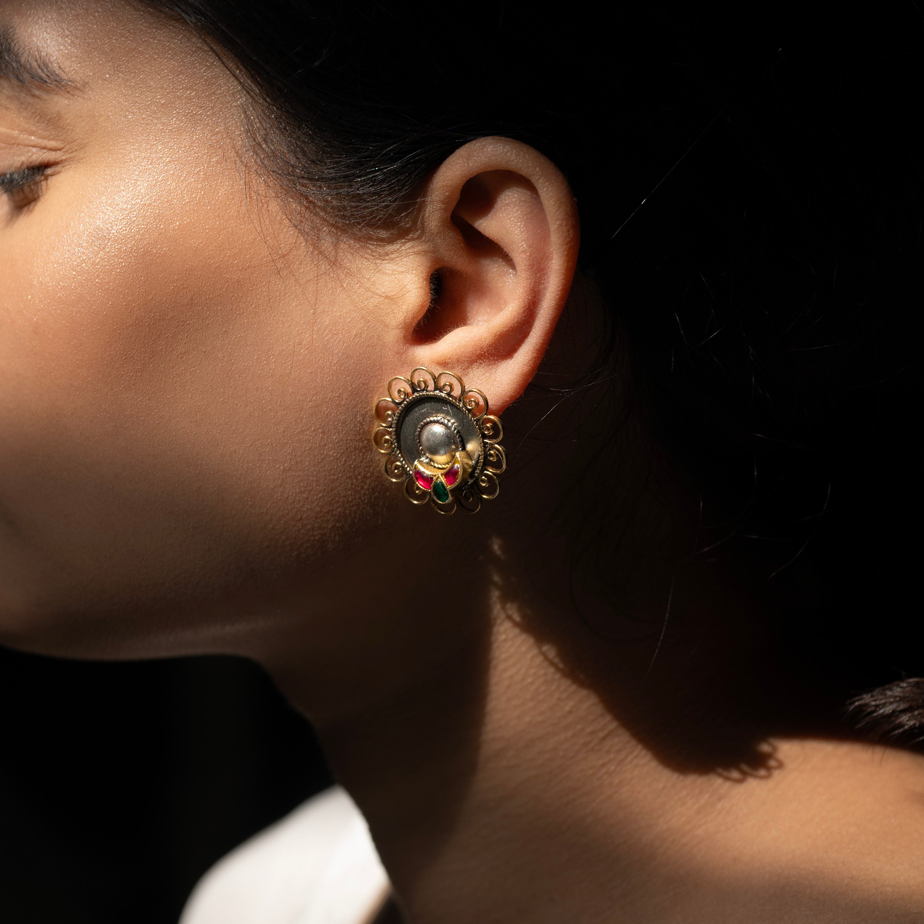Stunning silver ethnic earrings with intricate detailing, embodying traditional elegance and grace. 