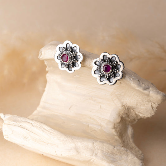 Timeless silver studs exuding simple elegance and subtle sophistication