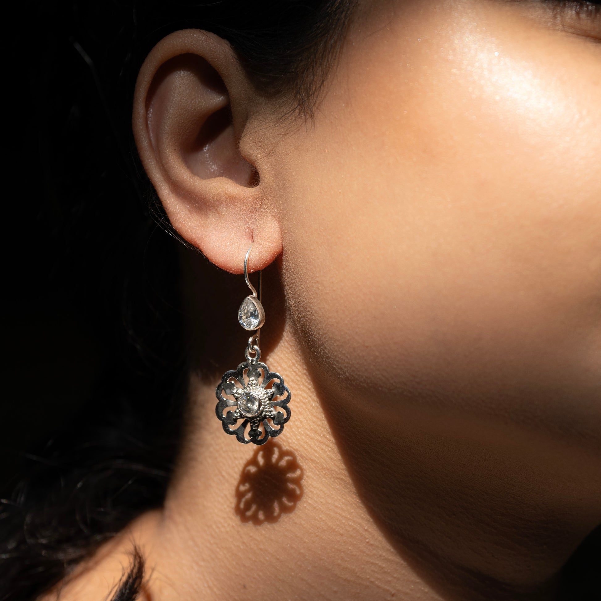 Stylish silver earrings featuring a sleek and modern design for everyday elegance