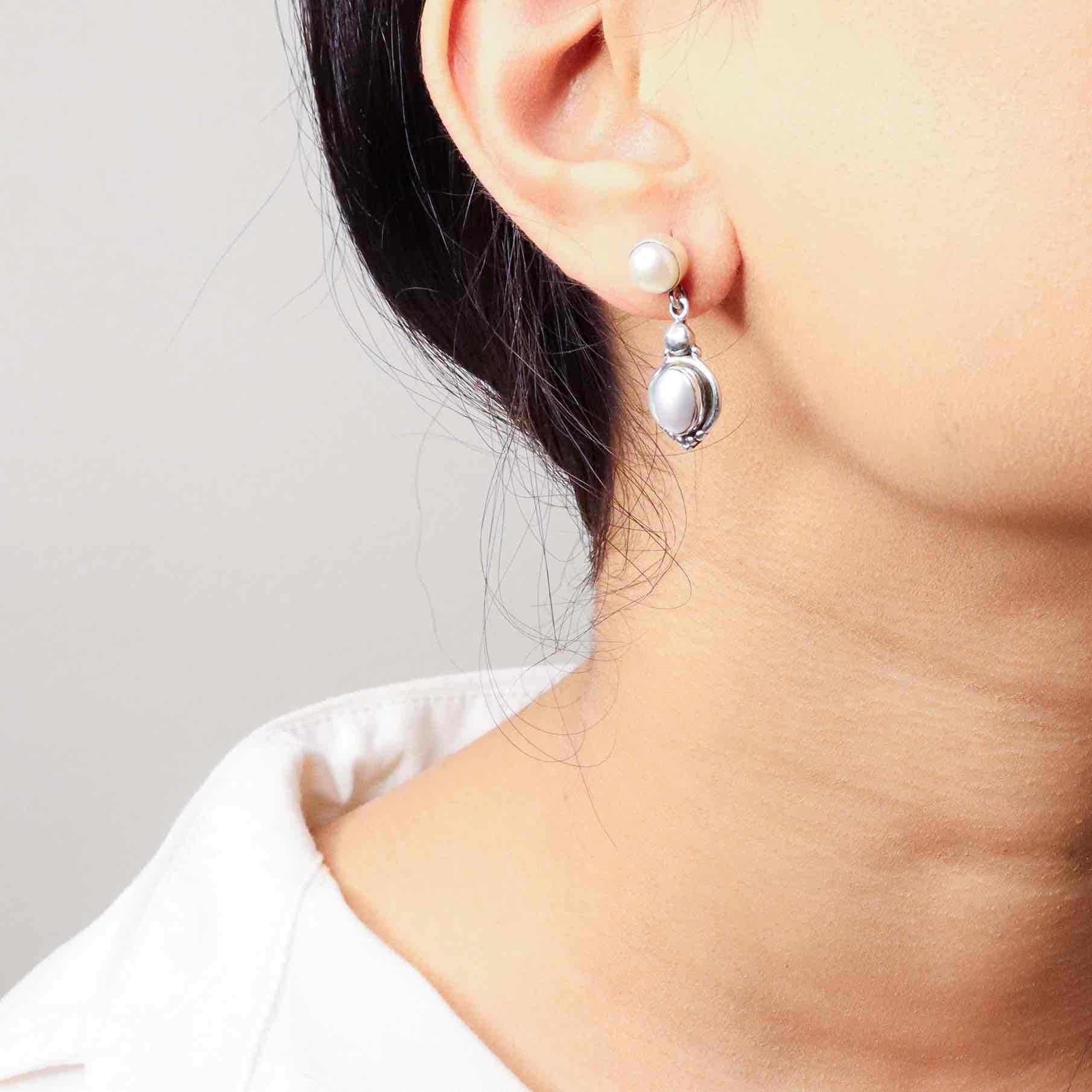 Stylish silver earrings featuring a sleek and modern design for everyday elegance