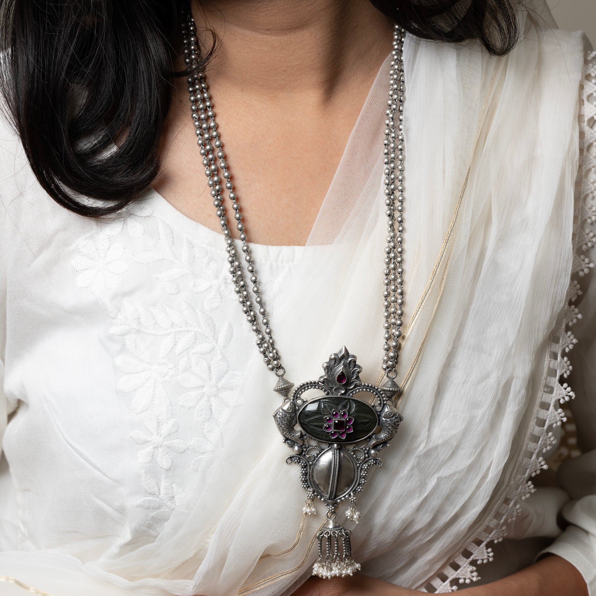 Oxidized sterling silver long necklace with a vintage-inspired charm and a timeless look.