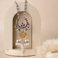 Oxidized sterling silver long necklace with a vintage-inspired charm and a timeless look.
