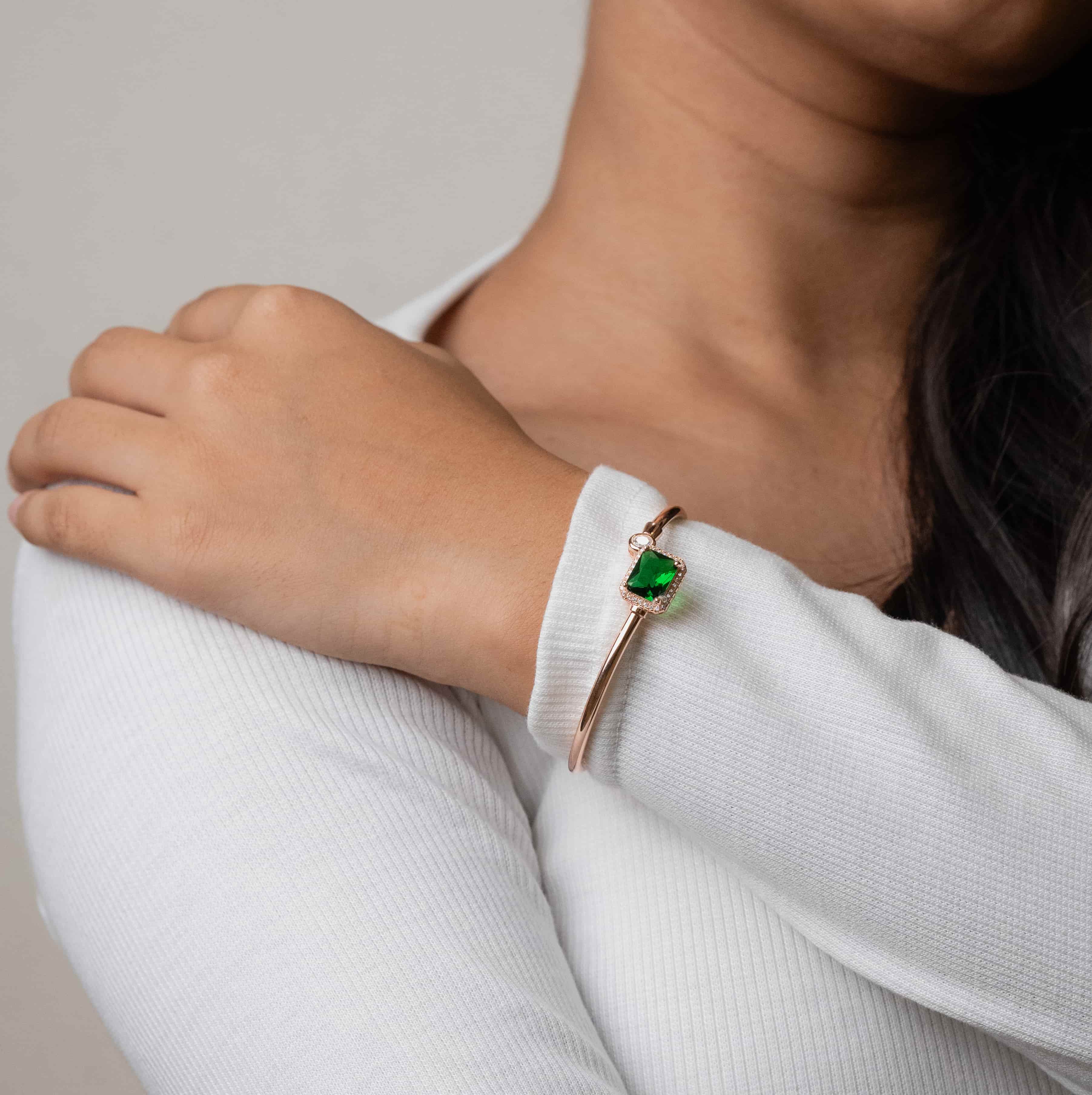 Elegant silver bracelet with a rose gold finish for women, featuring a sleek and sophisticated design, perfect for adding a touch of warmth and luxury to any outfit.

