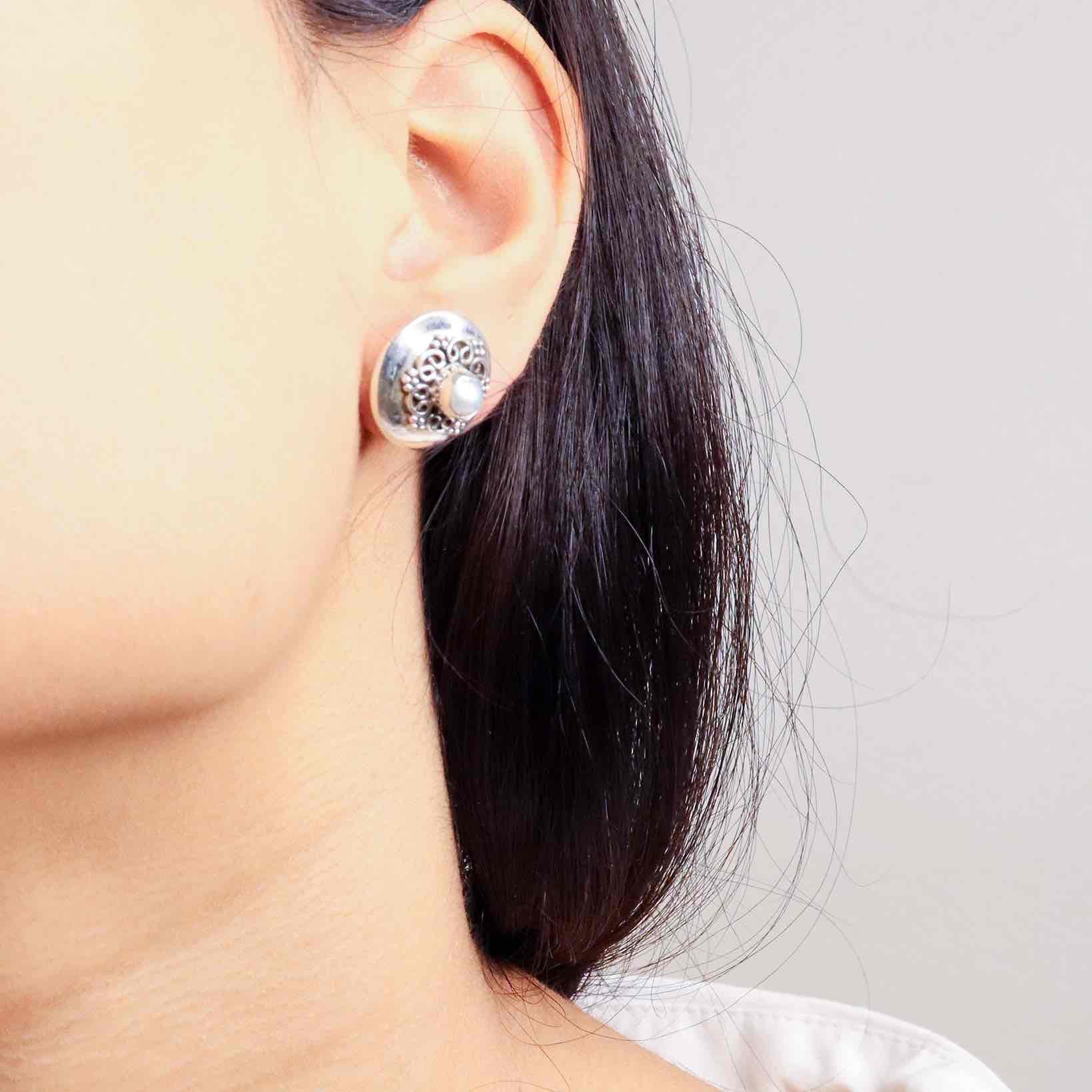 Timeless silver studs exuding simple elegance and subtle sophistication